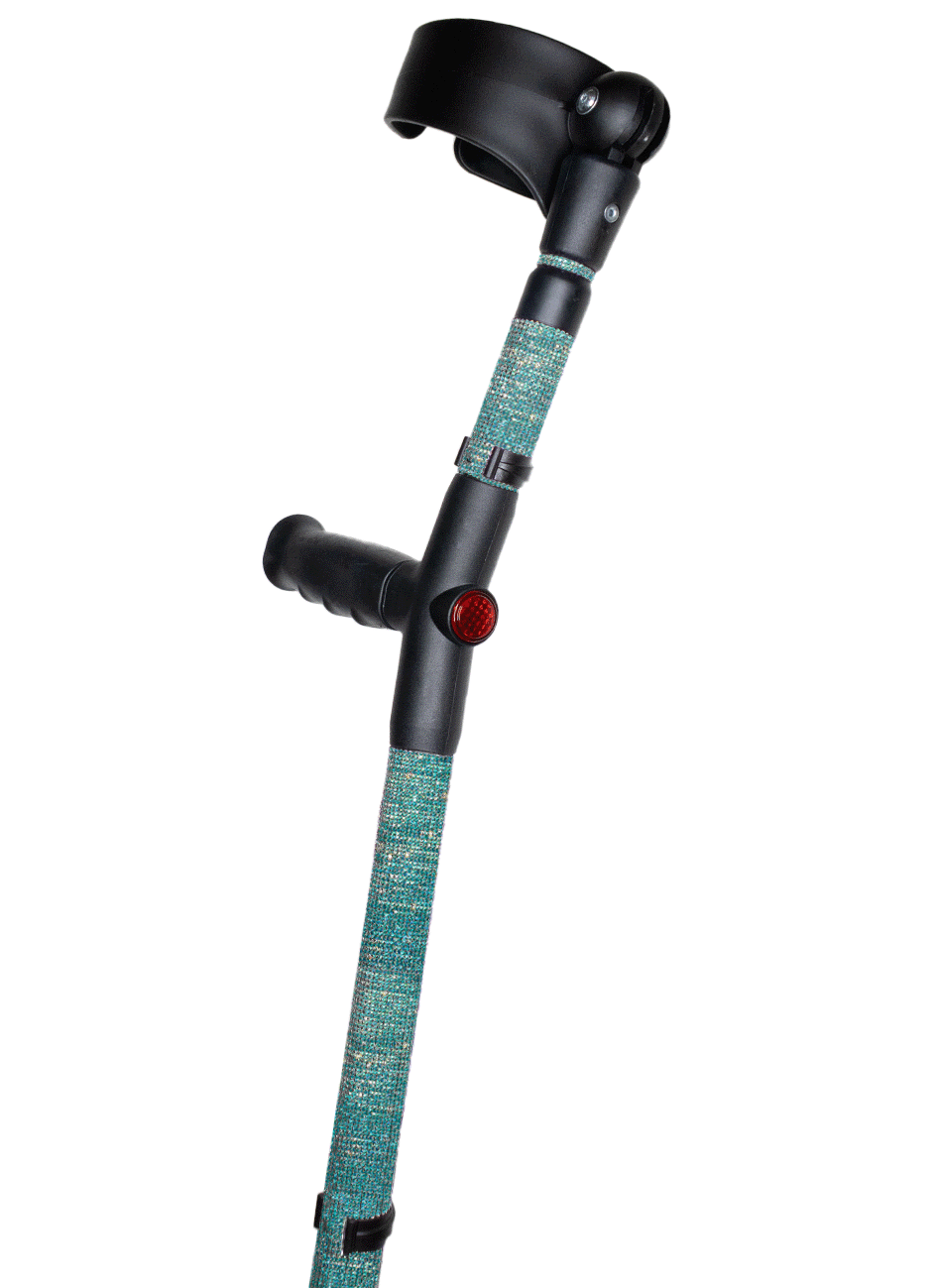 Crutch with a black handle and cuff decorated with blue coloured glass rhinestones. The crutch also has a red reflective circle at the back and the front of the handle.