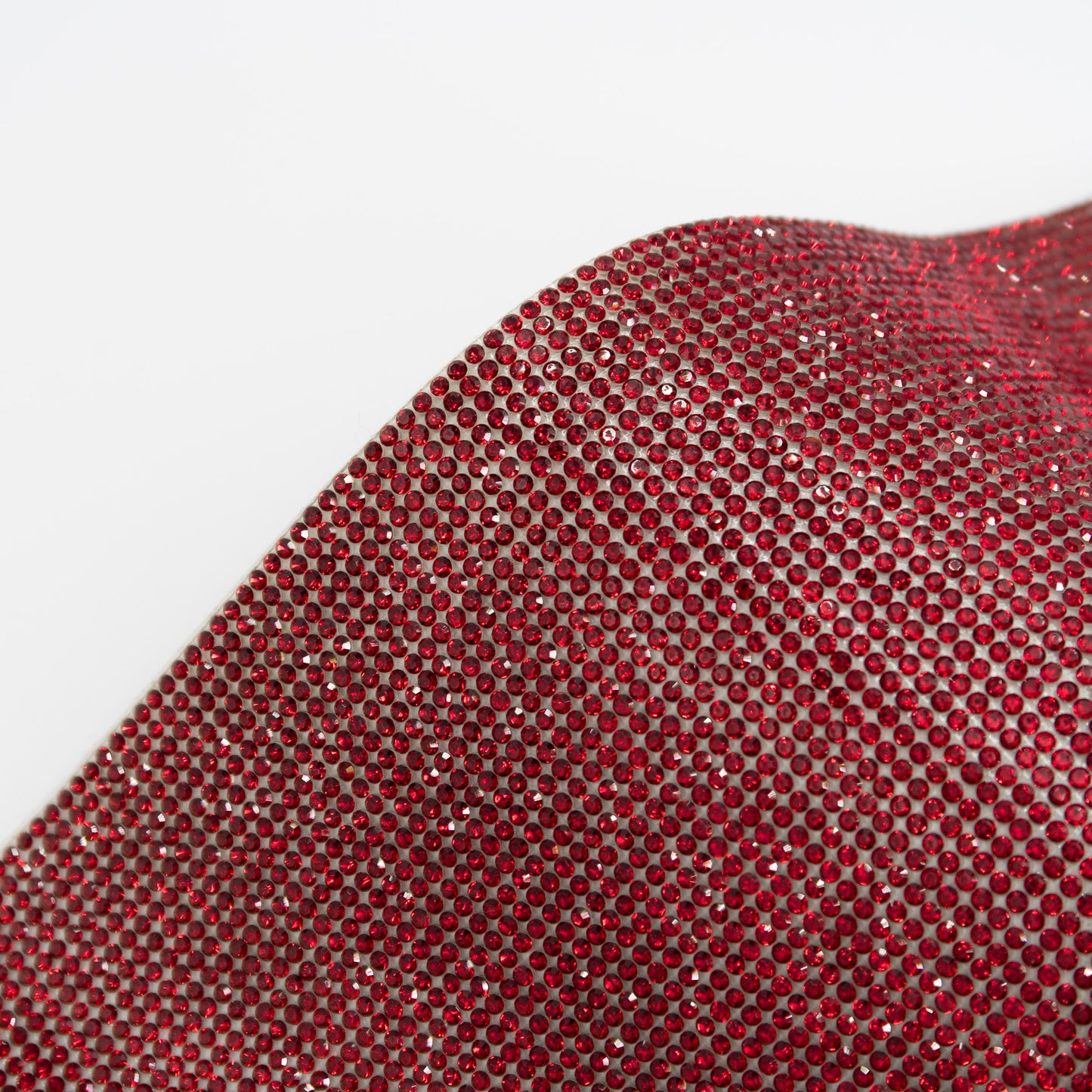 Close up of wine red coloured rhinestones