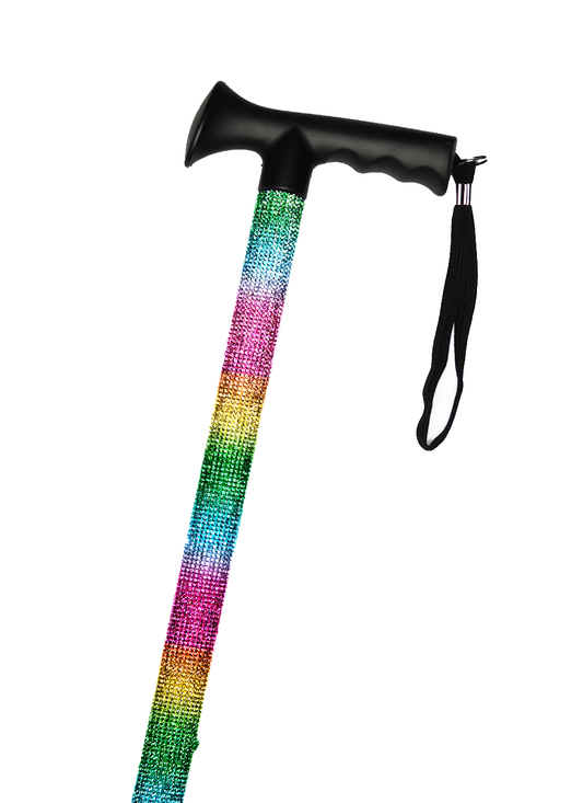 Walking stick with a black handle and black strap decorated with coloured glass rhinestones in a striped rainbow pattern